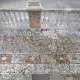 Un pavimento �a mosaico� di pietruzze bianche e rosse con la scritta �Villa Rachele�...